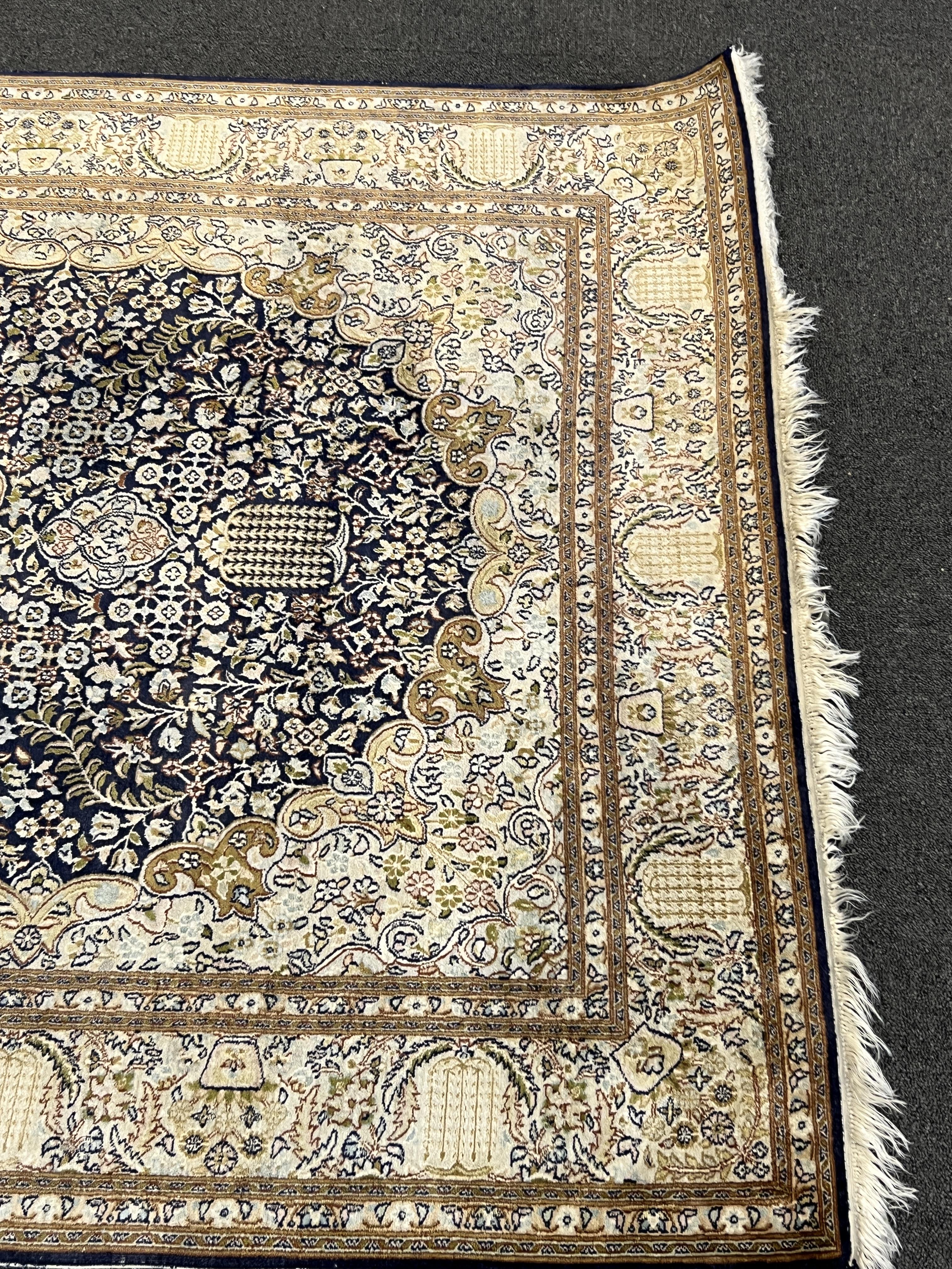 A Persian silk rug, 180 x 120cm